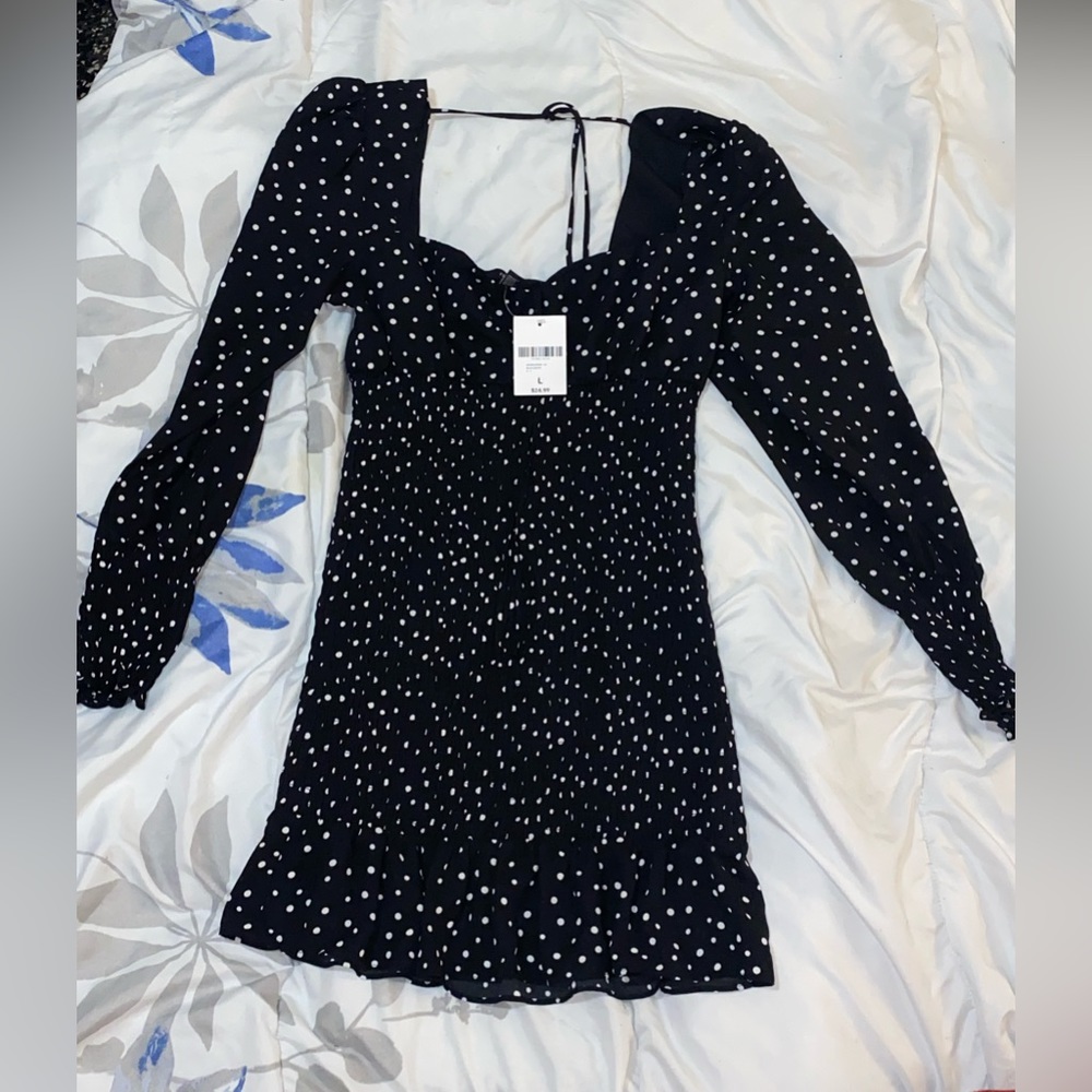 Large polkadot puffed shoulder dress ribbed in the waist